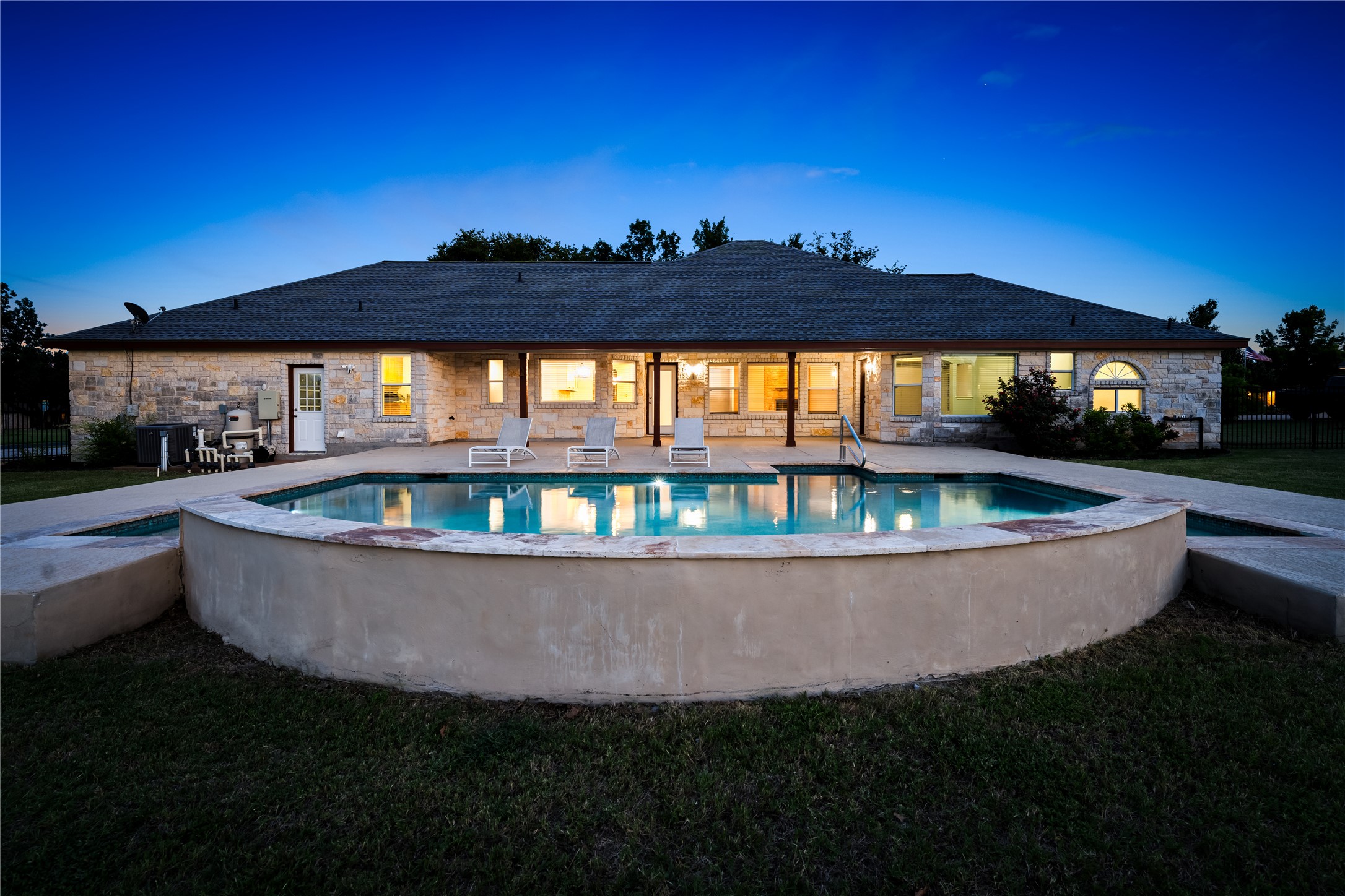 110 Starlight Trail Georgetown, TX 78633 - Photo 5 of 36 Backyard glow and poolside serenity at sunset