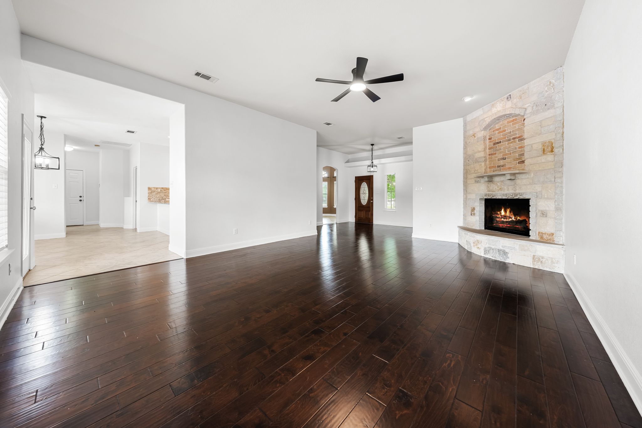 110 Starlight Trail Georgetown, TX 78633 - Photo 8 of 36 Warm hardwoods and natural light fill this inviting living room