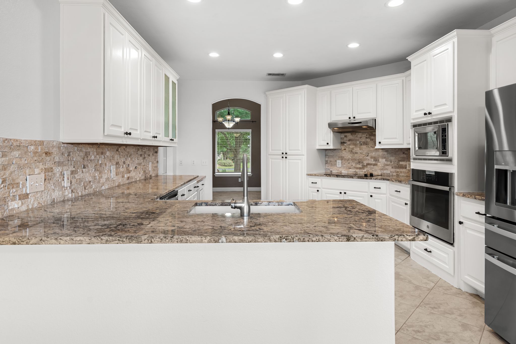 110 Starlight Trail Georgetown, TX 78633 - Photo 10 of 36 Chef-inspired kitchen with built-in stainless steel appliances