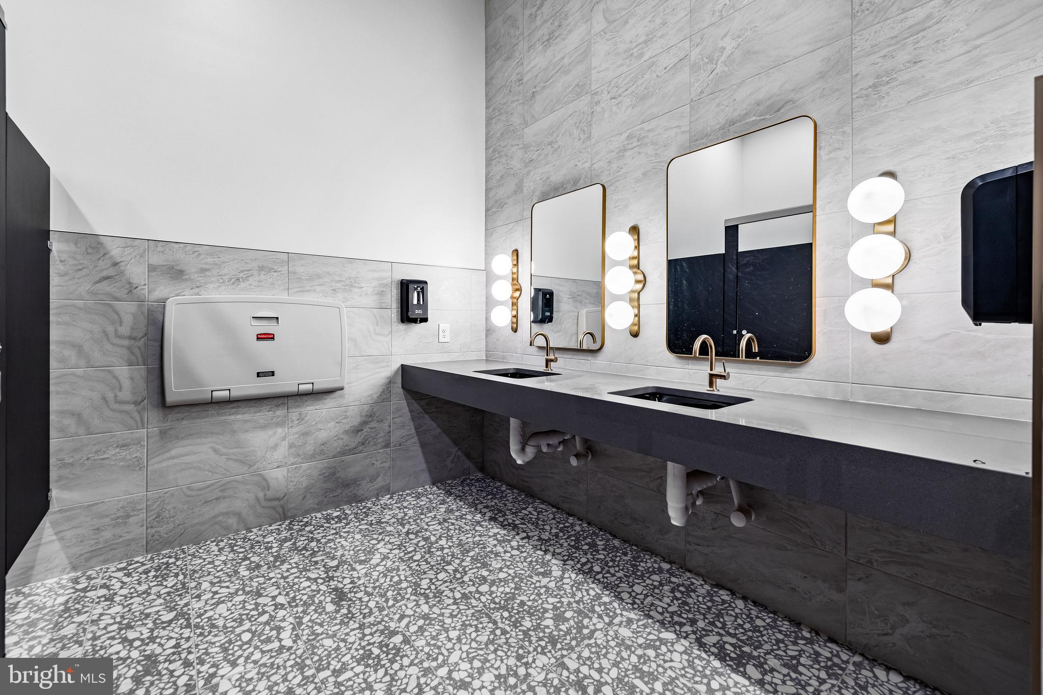 1201 Walnut Bottom Road, Unit 9202 Carlisle, PA 17015 - Photo 32 of 33 a bathroom with a double vanity sink and a mirror