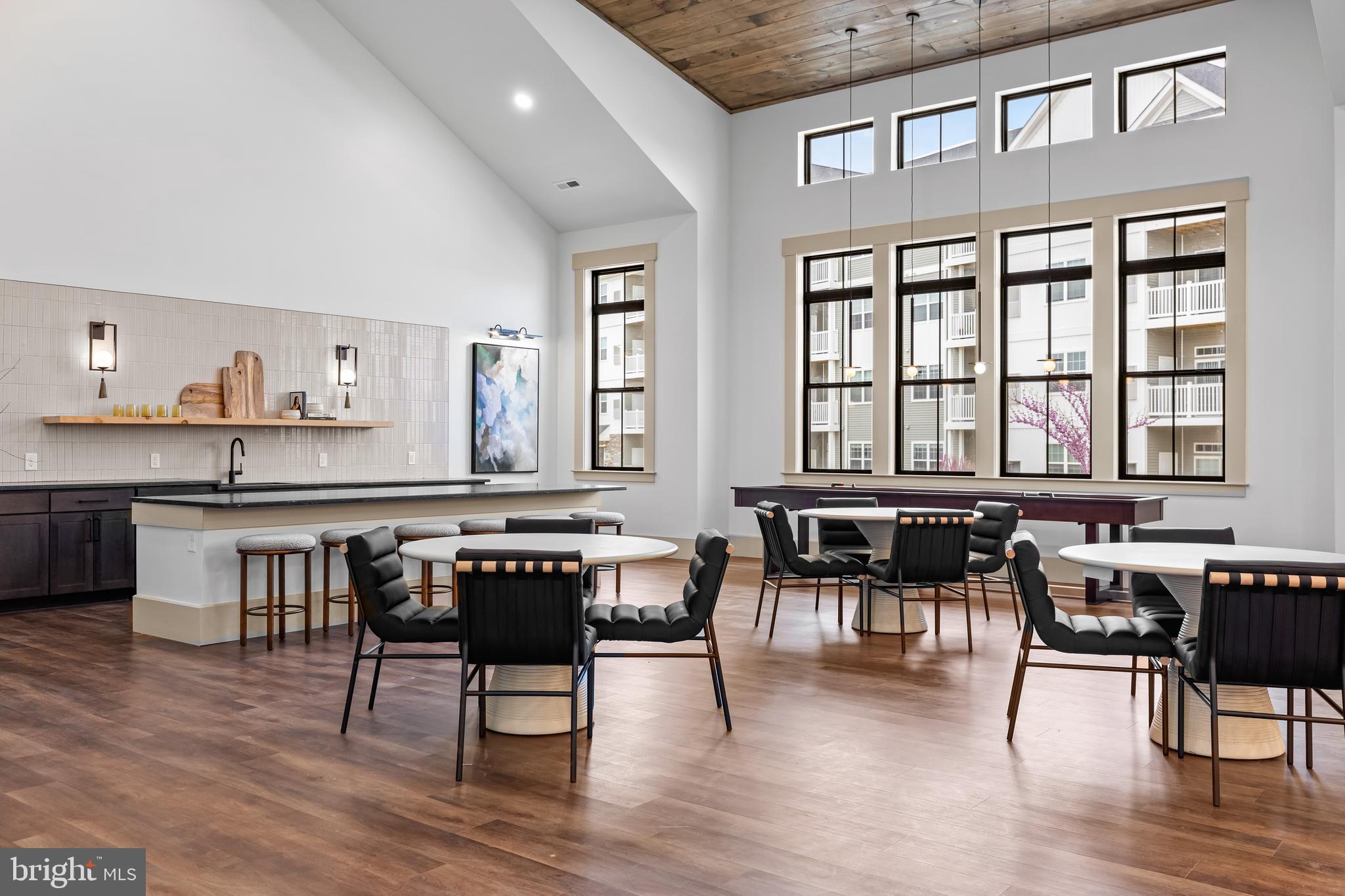 1201 Walnut Bottom Road, Unit 9202 Carlisle, PA 17015 - Photo 4 of 33 a kitchen with a dining table chairs and wooden floor