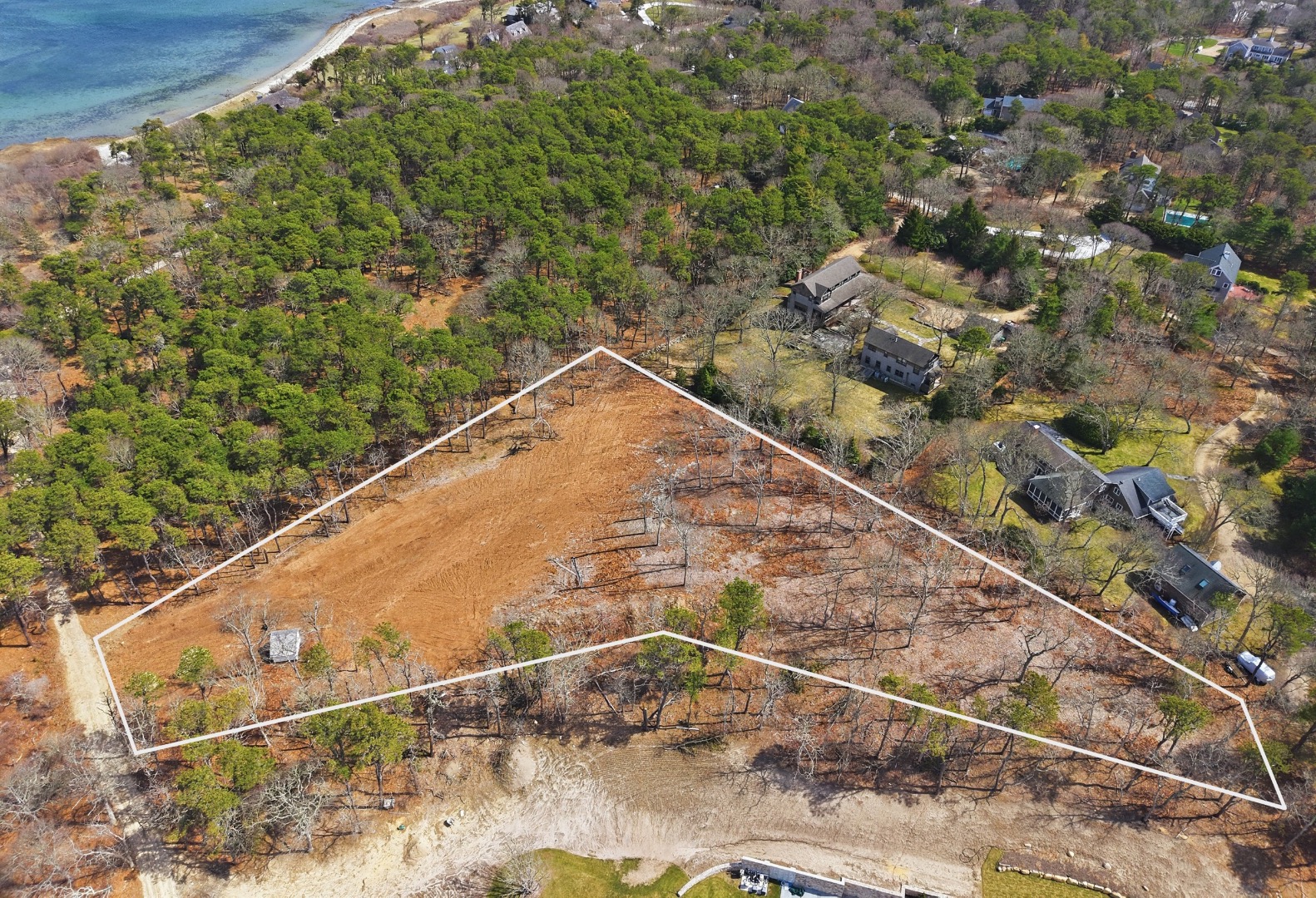 5 Lenssen Way Edgartown, MA 02539 - Photo 3 of 5 a view of a yard with a tree