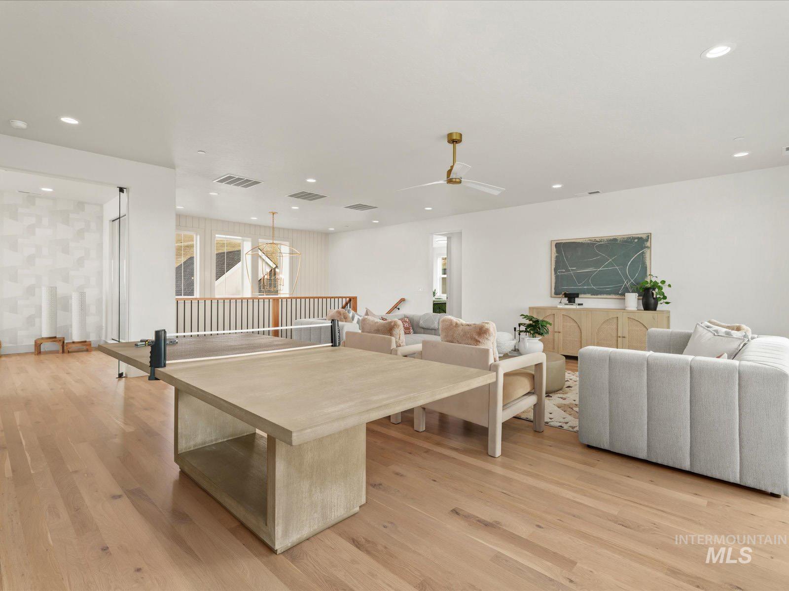 6161 East Prominence Court Boise, ID 83716 - Photo 25 of 45 Living room featuring light wood-style flooring, recessed lighting, and a ceiling fan