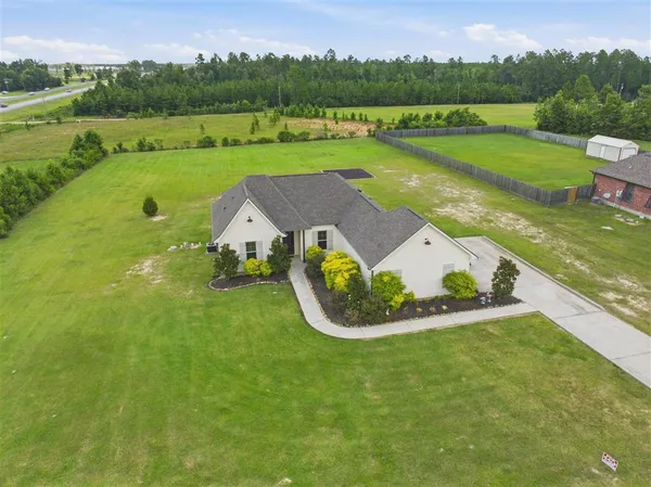 $345,000 | 133 Plantation Trace Drive, Longville, LA 70652