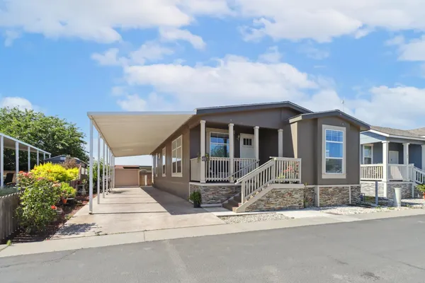 front view of house with a yard