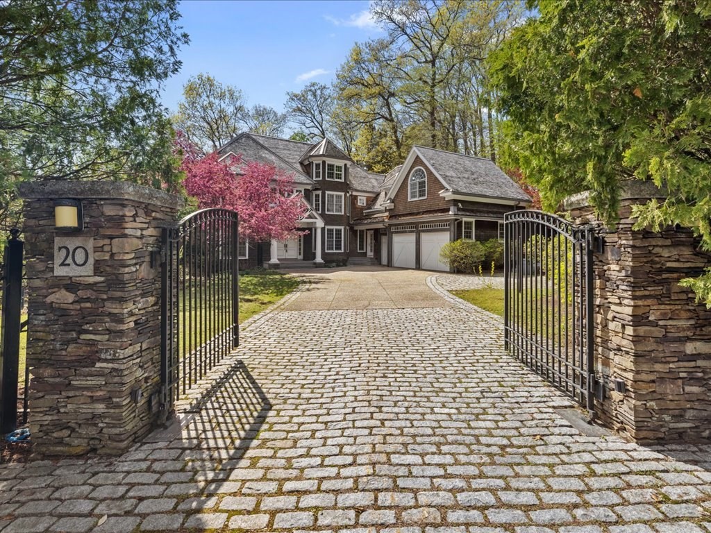 20 Laura Road Newton, MA 02468 - Photo 1 of 42 a front view of a house with a garden