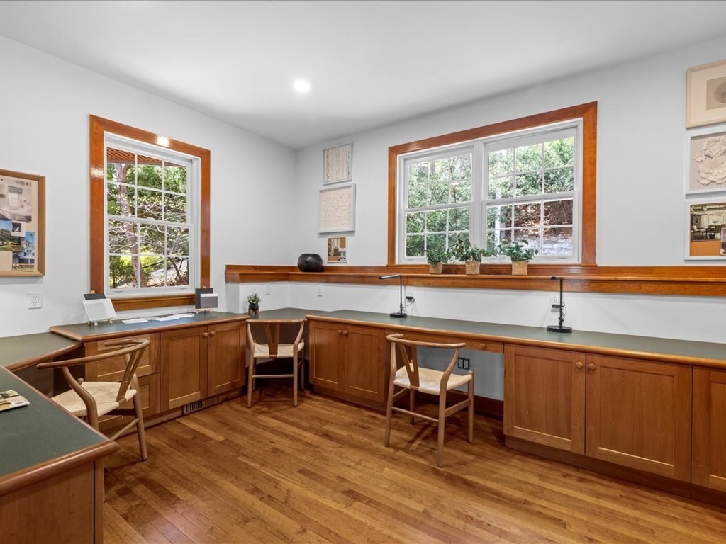 20 Laura Road Newton, MA 02468 - Photo 17 of 42 a kitchen with a table chairs sink and cabinets