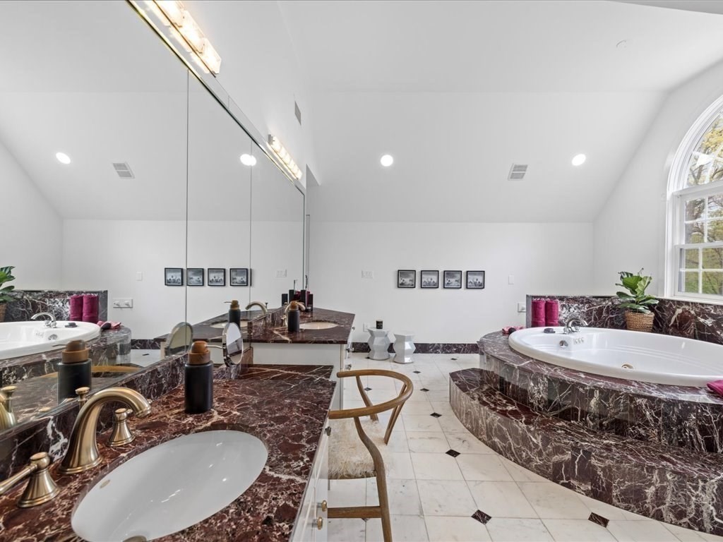 20 Laura Road Newton, MA 02468 - Photo 22 of 42 a living room with furniture a rug and white walls