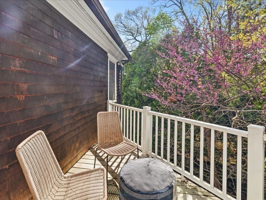 20 Laura Road Newton, MA 02468 - Photo 24 of 42 a view of a chair in wooden deck