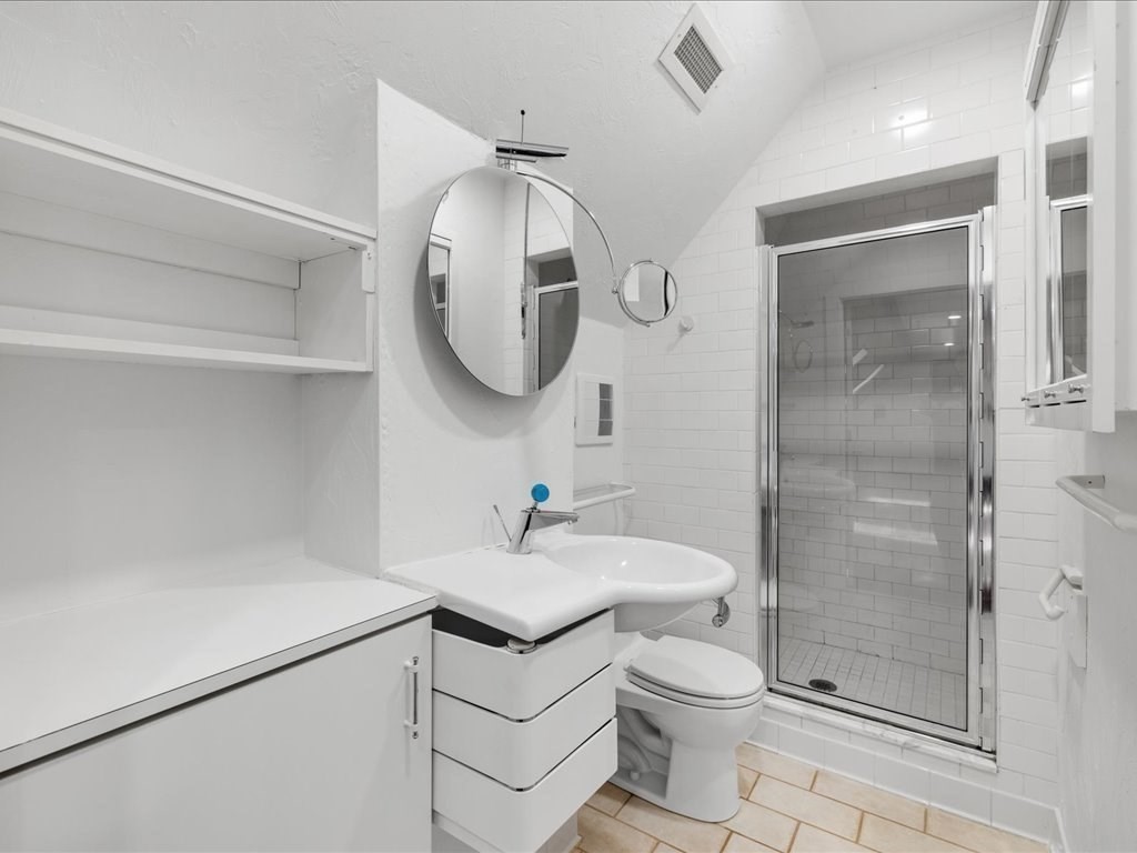 20 Laura Road Newton, MA 02468 - Photo 35 of 42 a bathroom with a sink toilet and shower
