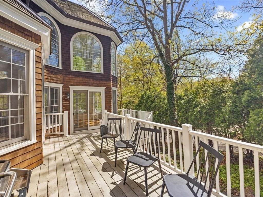 20 Laura Road Newton, MA 02468 - Photo 40 of 42 a view of a chair and table on the deck