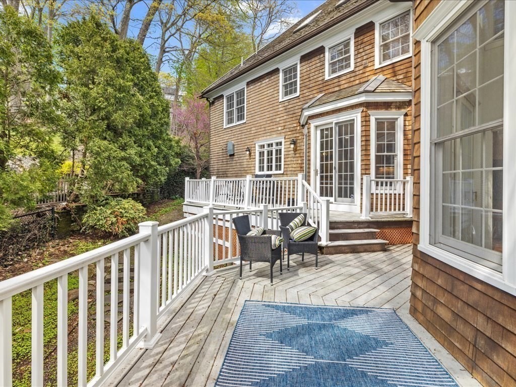 20 Laura Road Newton, MA 02468 - Photo 41 of 42 a balcony with wooden floor and outdoor seating
