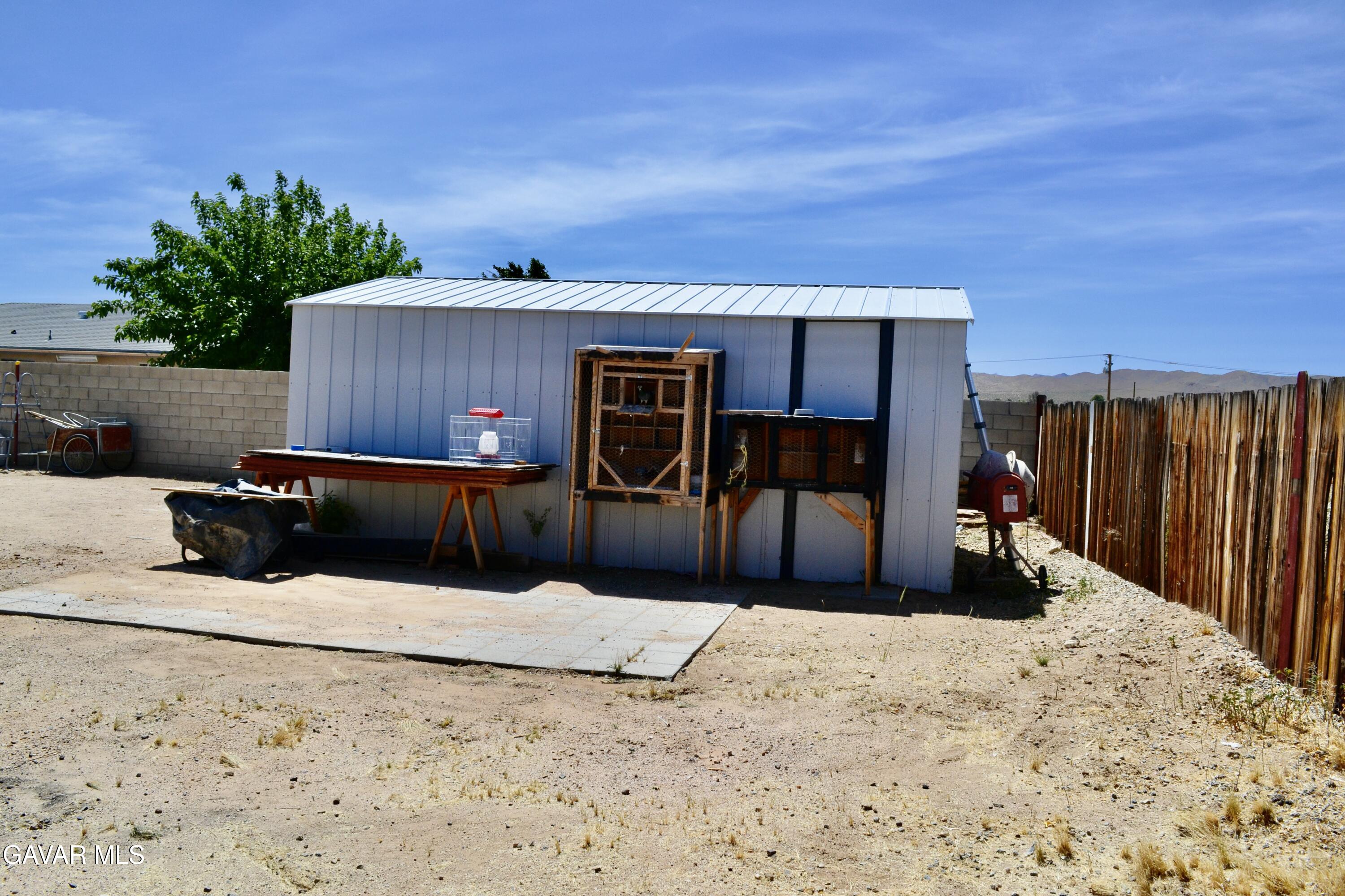 809 South Sunset Street Ridgecrest, CA 93555 - Photo 14 of 21 a view of a backyard