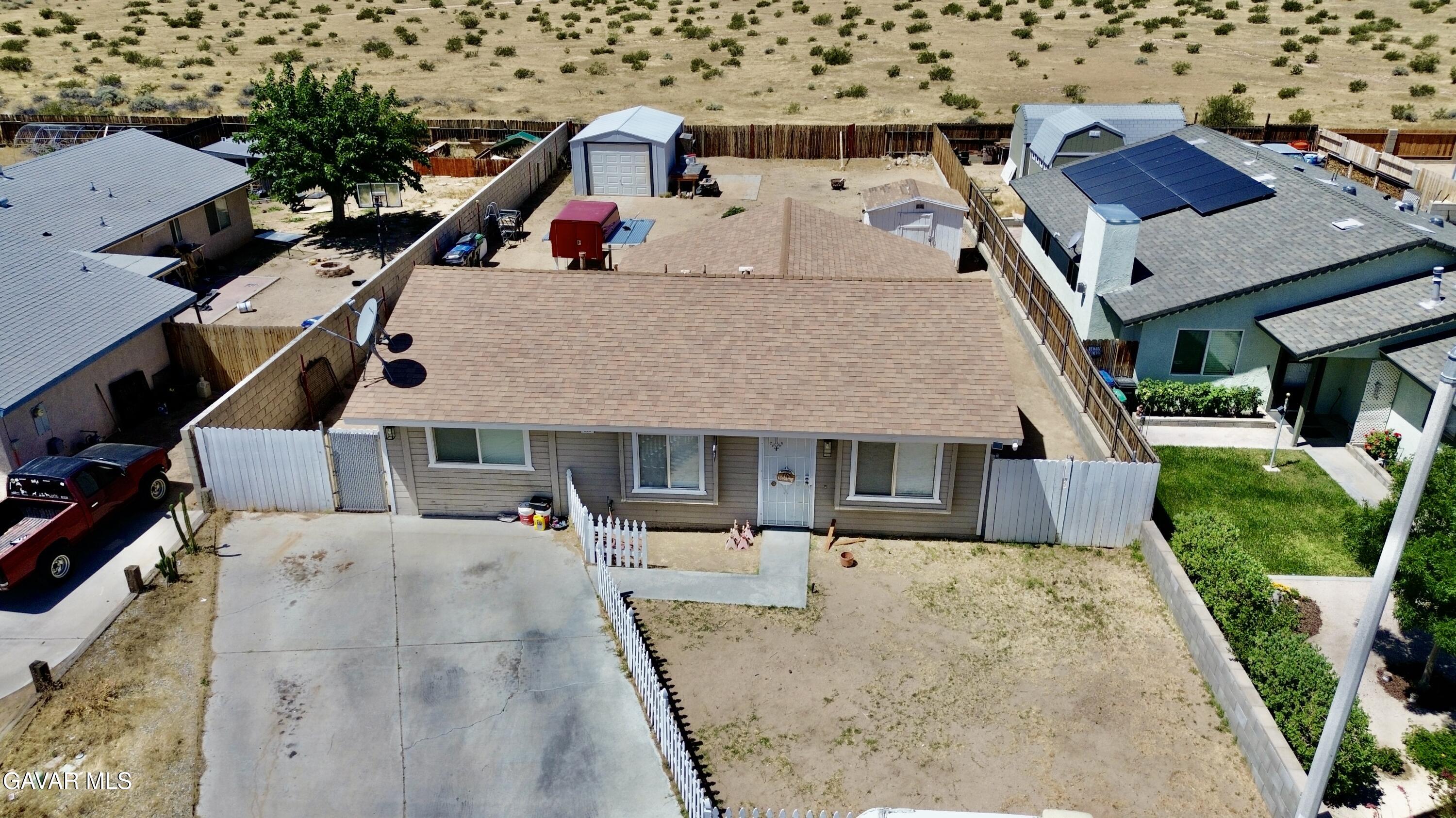 809 South Sunset Street Ridgecrest, CA 93555 - Photo 19 of 21 an aerial view of a house with a yard