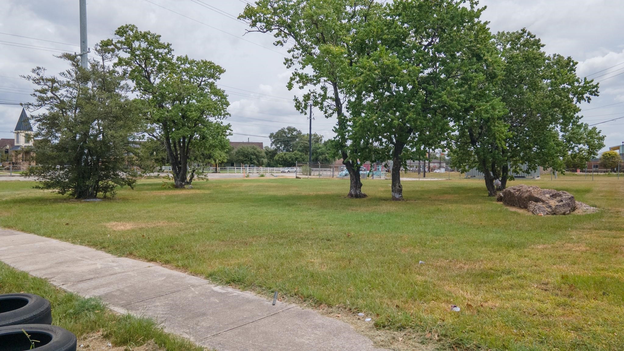 0 West Montgomery Road Houston, TX 77088 - Photo 5 of 9 a view of yard with tree and green space