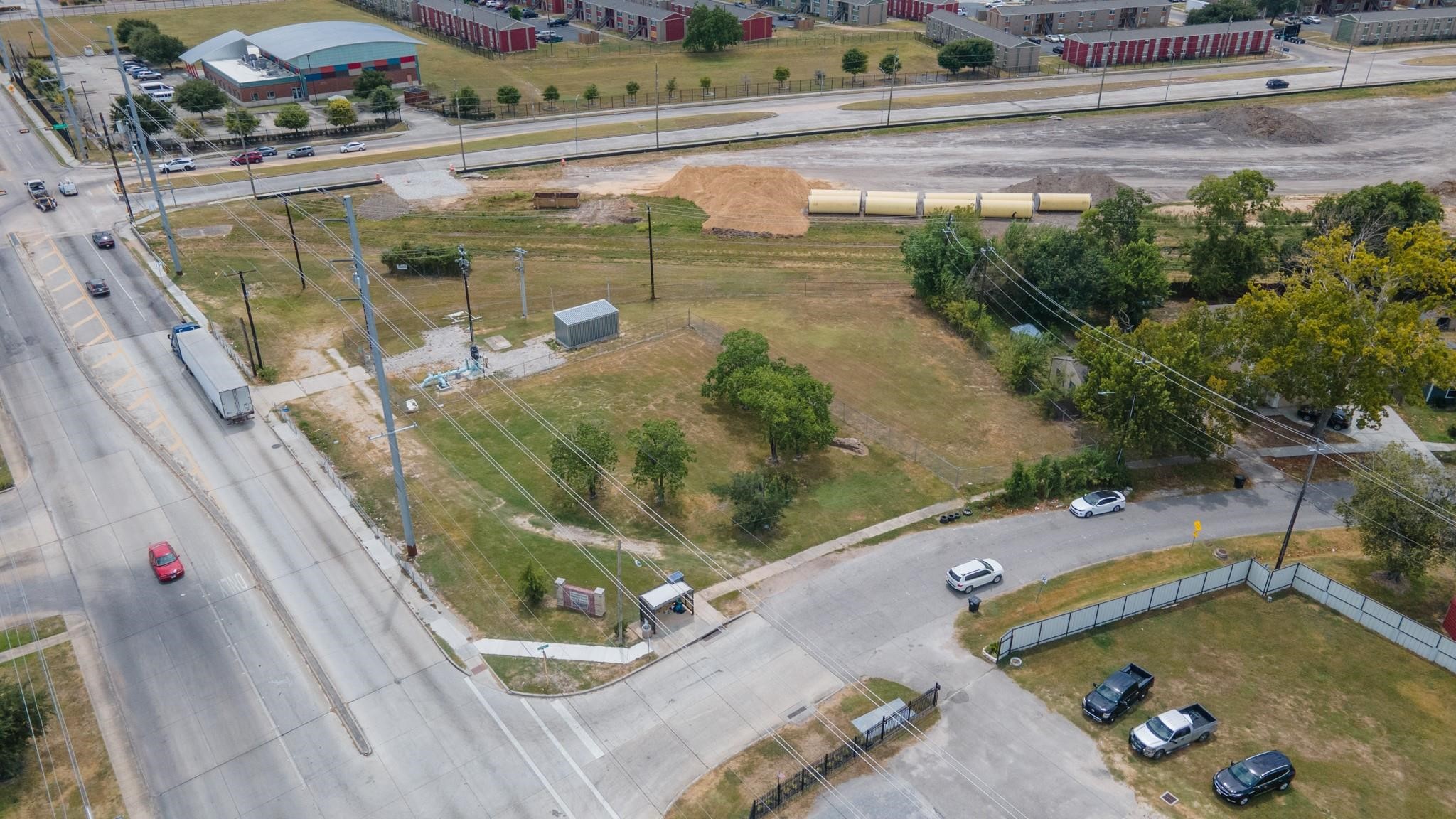 0 West Montgomery Road Houston, TX 77088 - Photo 7 of 9 a view of a swimming pool with a yard