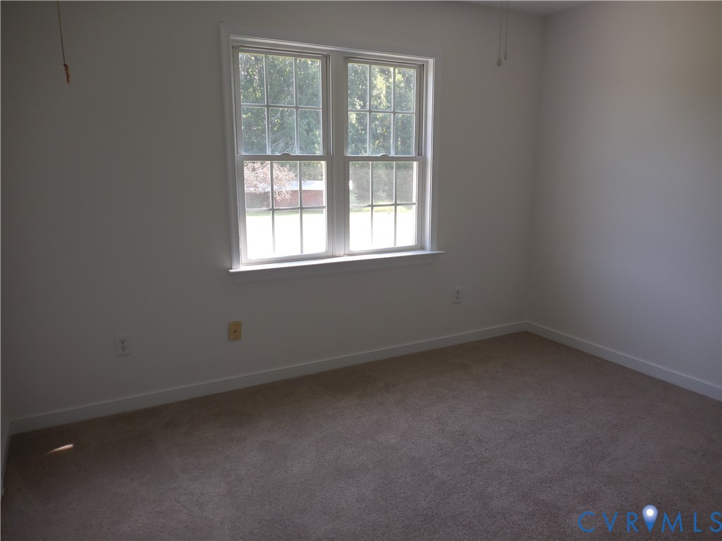 1781 Rolling Path Road Mineral, VA 23117 - Photo 12 of 23 Neutral-toned carpet flooring and white walls comp