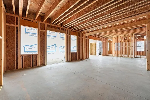 view of an empty room with a balcony