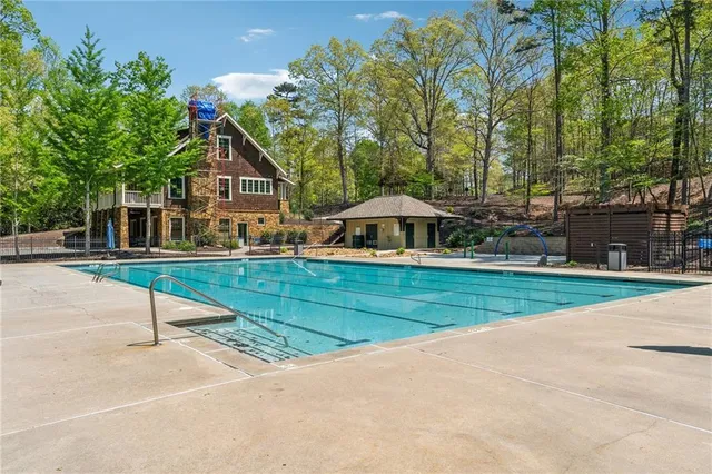 a view of a chairs and table on the deck
