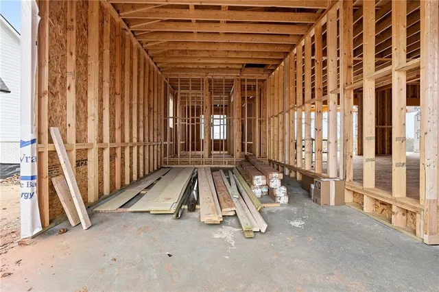 a view of an empty room with a balcony