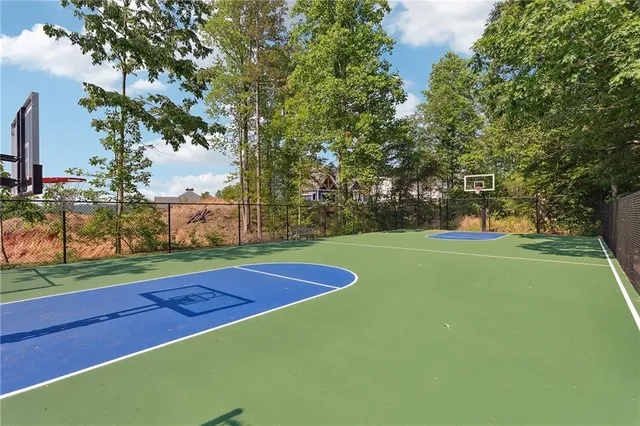a view of a house with sitting area and garden