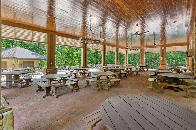 a view of a lake with outdoor seating