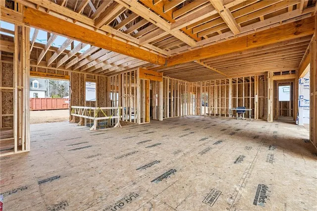 a view of a room with wooden walls