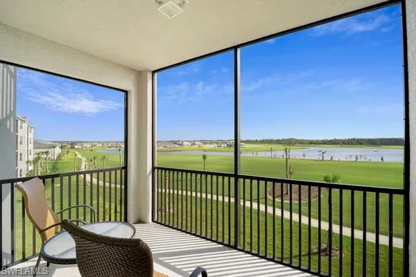 a view of a balcony with chair