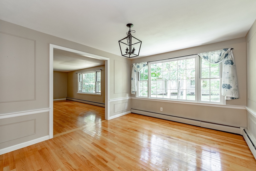 759 Williams Street Longmeadow, MA 01106 - Photo 11 of 40 a view of an empty room with wooden floor and a window