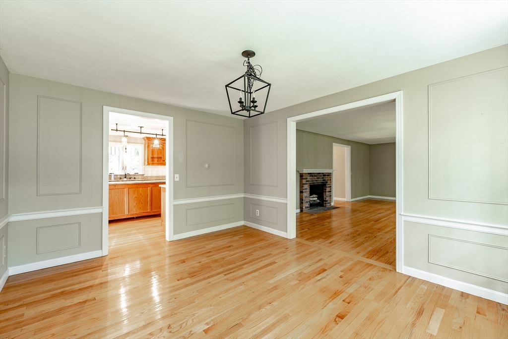 759 Williams Street Longmeadow, MA 01106 - Photo 12 of 40 a view of a livingroom with wooden floor and staircase