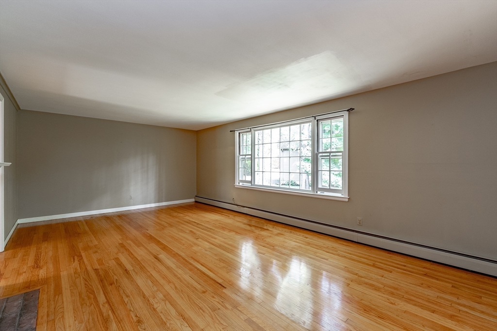 759 Williams Street Longmeadow, MA 01106 - Photo 17 of 40 a view of an empty room with wooden floor and a window