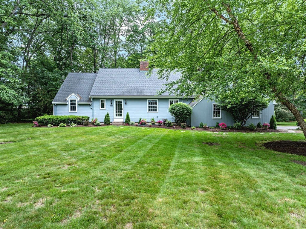 759 Williams Street Longmeadow, MA 01106 - Photo 2 of 40 a front view of house with yard and green space