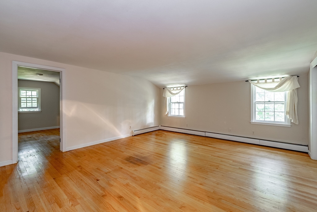 759 Williams Street Longmeadow, MA 01106 - Photo 24 of 40 an empty room with wooden floor and windows