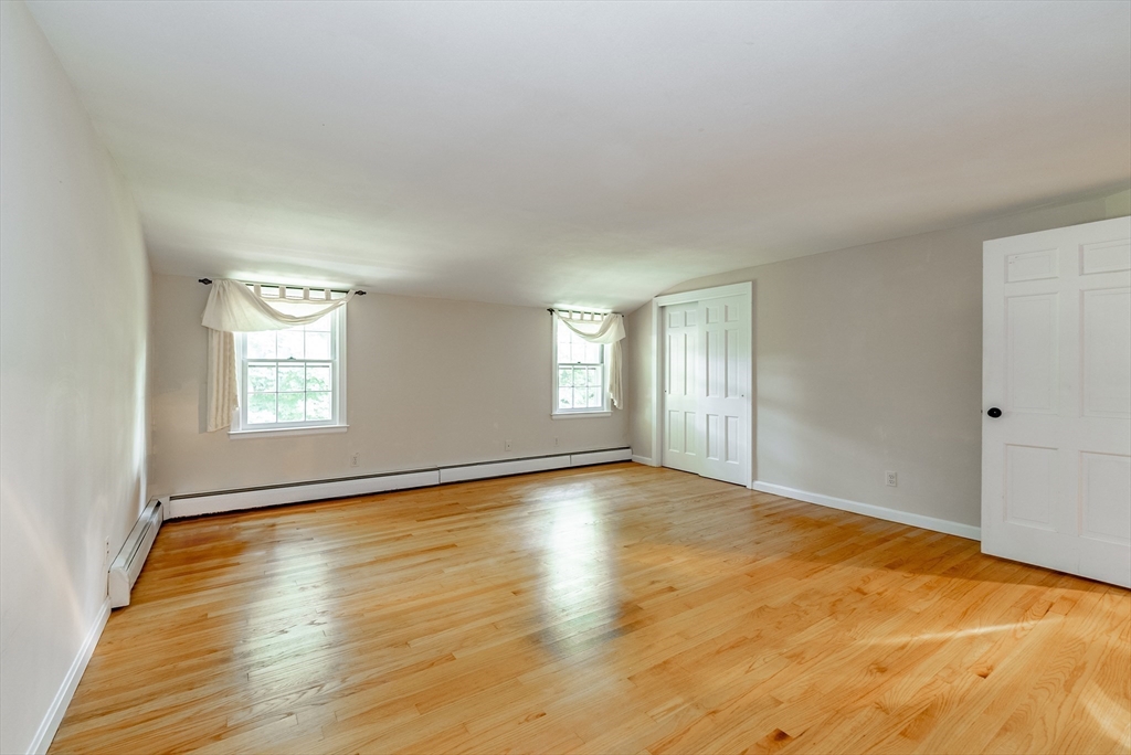 759 Williams Street Longmeadow, MA 01106 - Photo 25 of 40 a view of an empty room with wooden floor and window