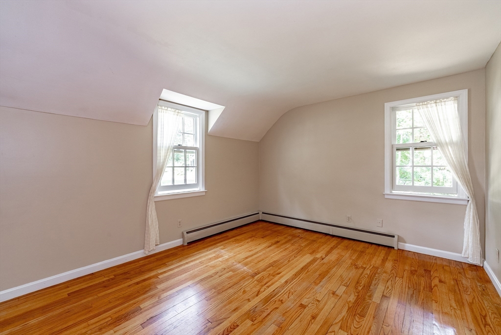 759 Williams Street Longmeadow, MA 01106 - Photo 28 of 40 an empty room with wooden floor and windows