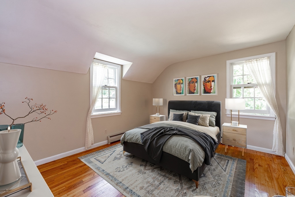 759 Williams Street Longmeadow, MA 01106 - Photo 29 of 40 a bedroom with a bed and wooden floor