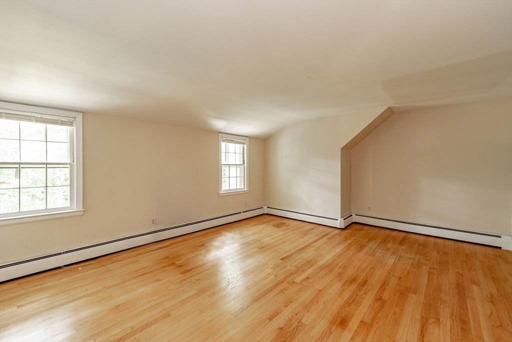 759 Williams Street Longmeadow, MA 01106 - Photo 31 of 40 an empty room with wooden floor and windows