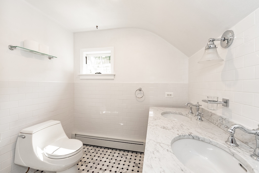 759 Williams Street Longmeadow, MA 01106 - Photo 33 of 40 a bathroom with a sink a toilet and shower