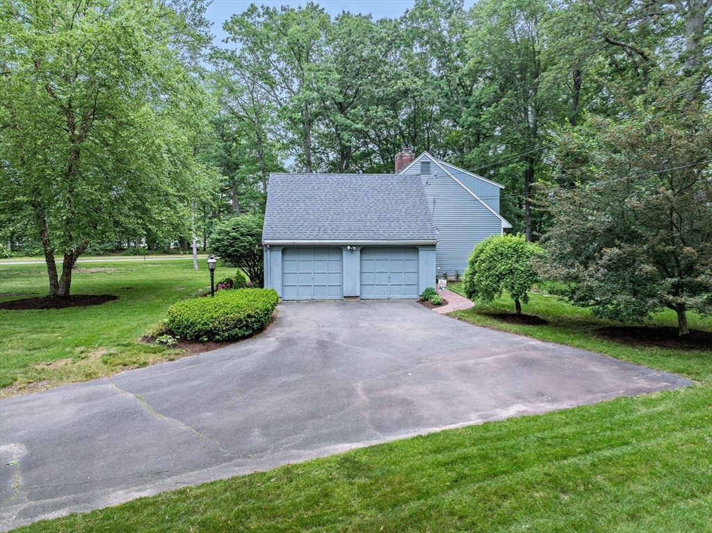 759 Williams Street Longmeadow, MA 01106 - Photo 36 of 40 a aerial view of a house with a yard and a large tree