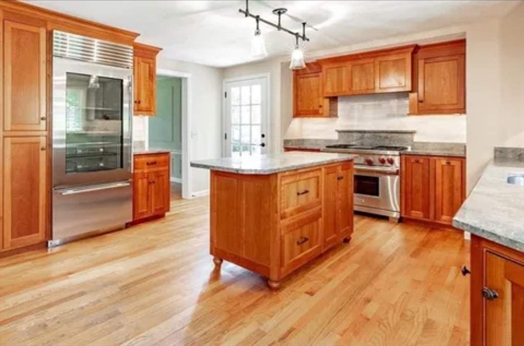 759 Williams Street Longmeadow, MA 01106 - Photo 6 of 40 a kitchen with stainless steel appliances granite countertop a stove a sink and a refrigerator