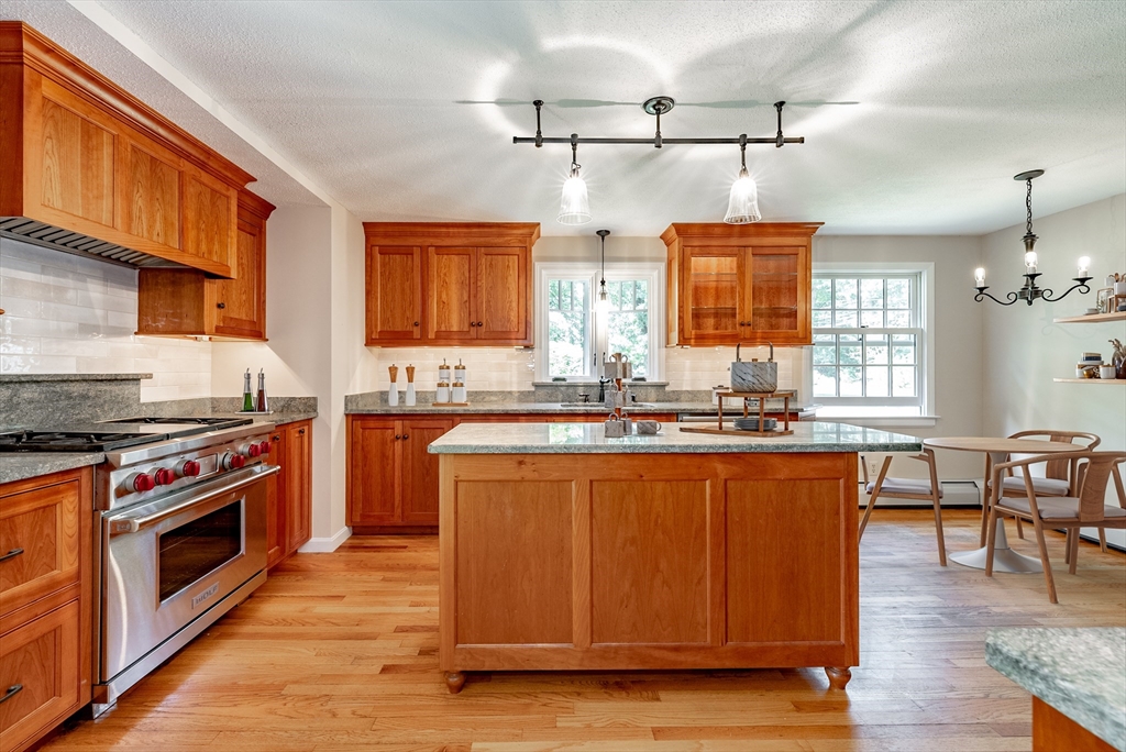 759 Williams Street Longmeadow, MA 01106 - Photo 8 of 40 a kitchen with stainless steel appliances granite countertop a stove a sink dishwasher and a refrigerator