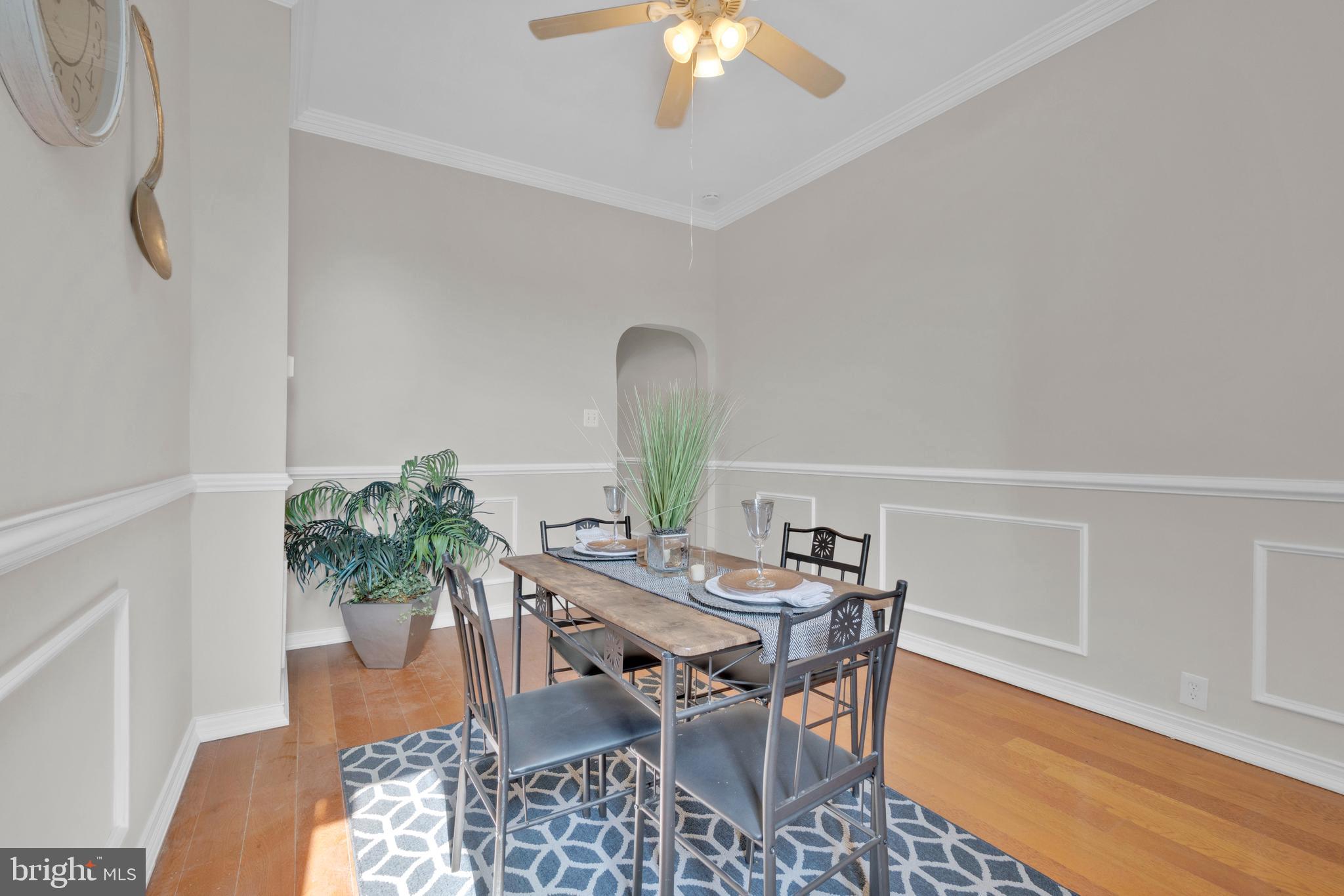 255 South Conkling Street Baltimore, MD 21224 - Photo 11 of 33 a view of a dining room with furniture and wooden floor