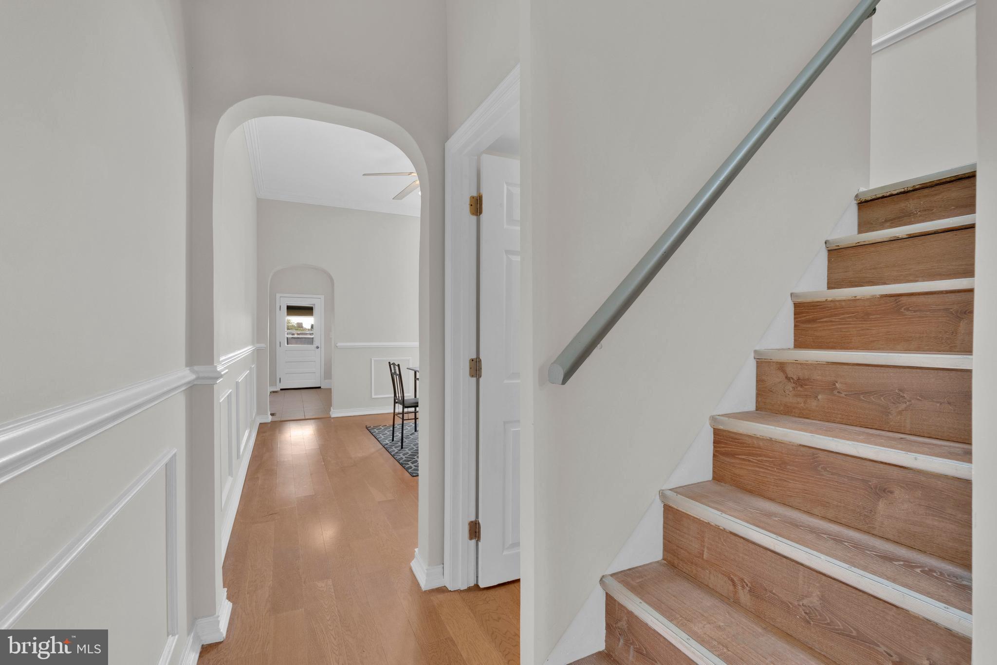 255 South Conkling Street Baltimore, MD 21224 - Photo 17 of 33 a view of entryway and hall with wooden floor