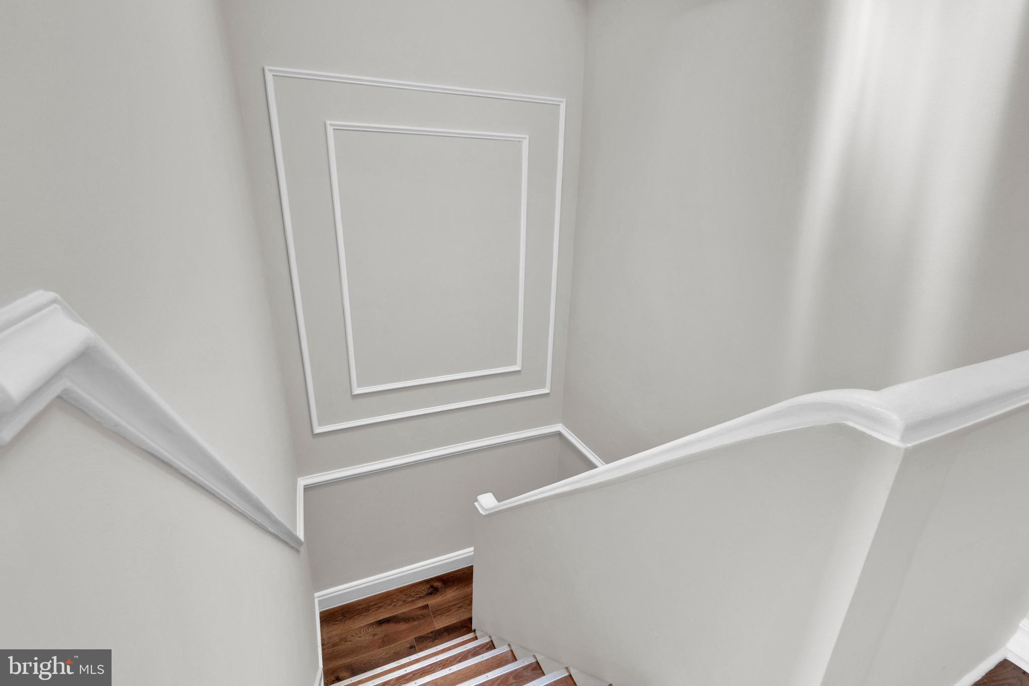 255 South Conkling Street Baltimore, MD 21224 - Photo 18 of 33 a view of an empty room with stairs