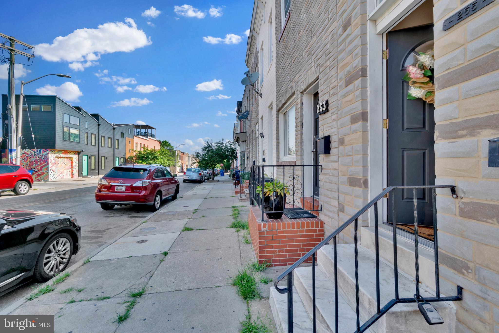 255 South Conkling Street Baltimore, MD 21224 - Photo 2 of 33 a view of a car park in front of a building