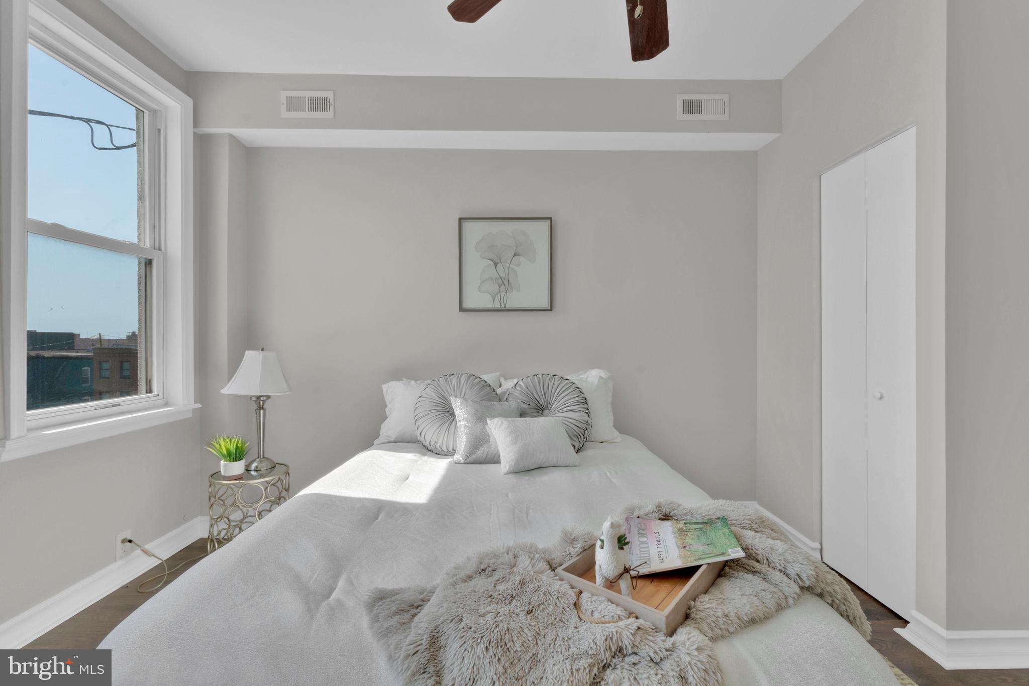 255 South Conkling Street Baltimore, MD 21224 - Photo 22 of 33 a bedroom with a bed and window