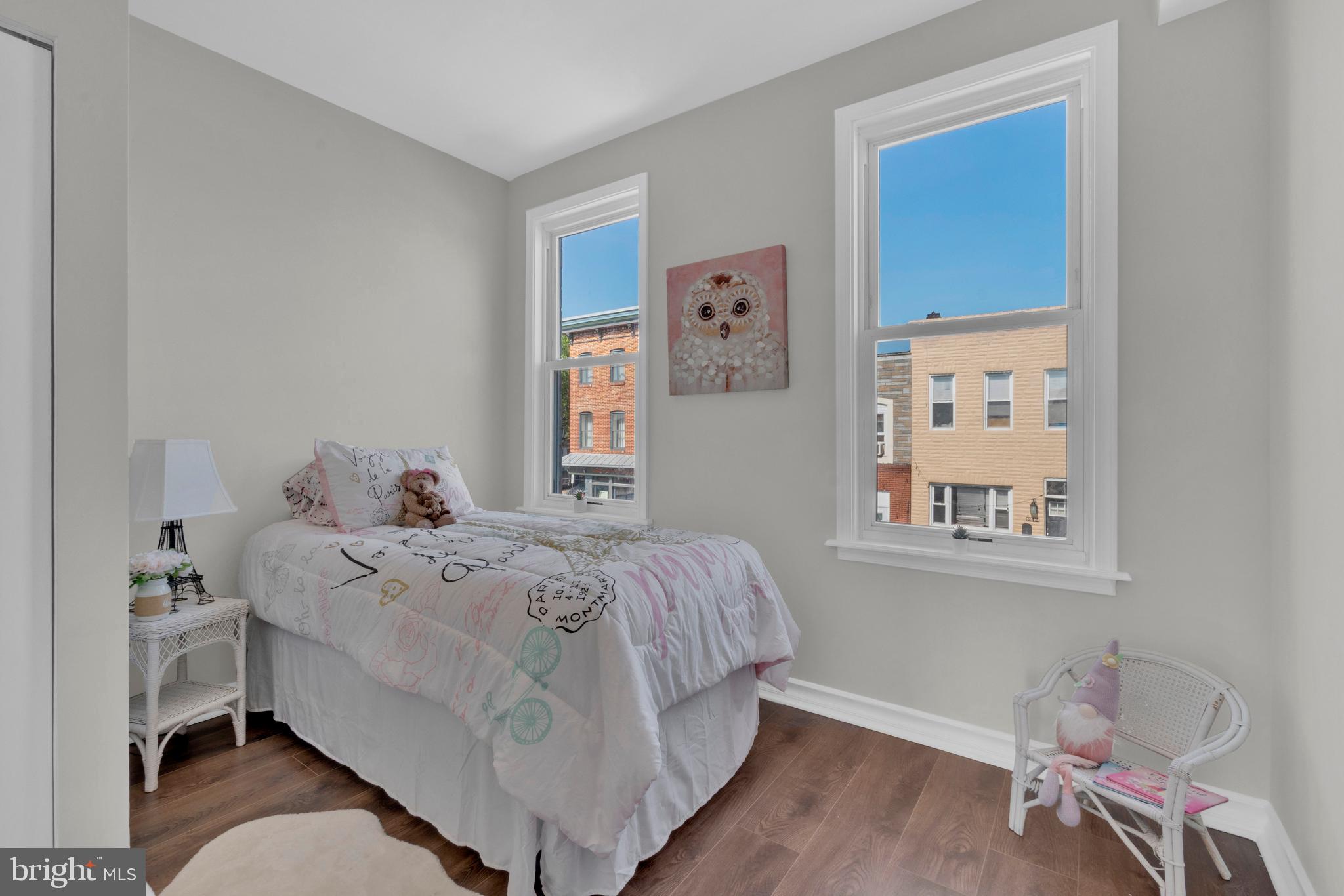 255 South Conkling Street Baltimore, MD 21224 - Photo 25 of 33 a bedroom with a bed and a window