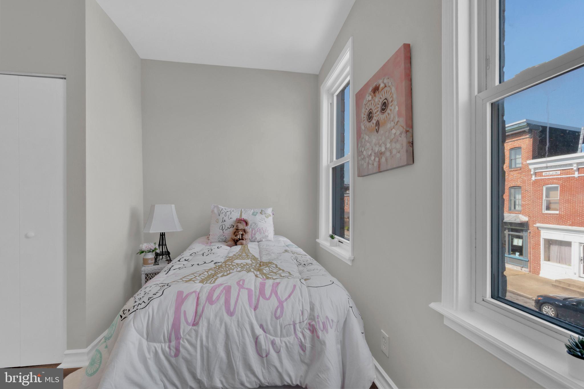 255 South Conkling Street Baltimore, MD 21224 - Photo 26 of 33 a bed sitting next to a window