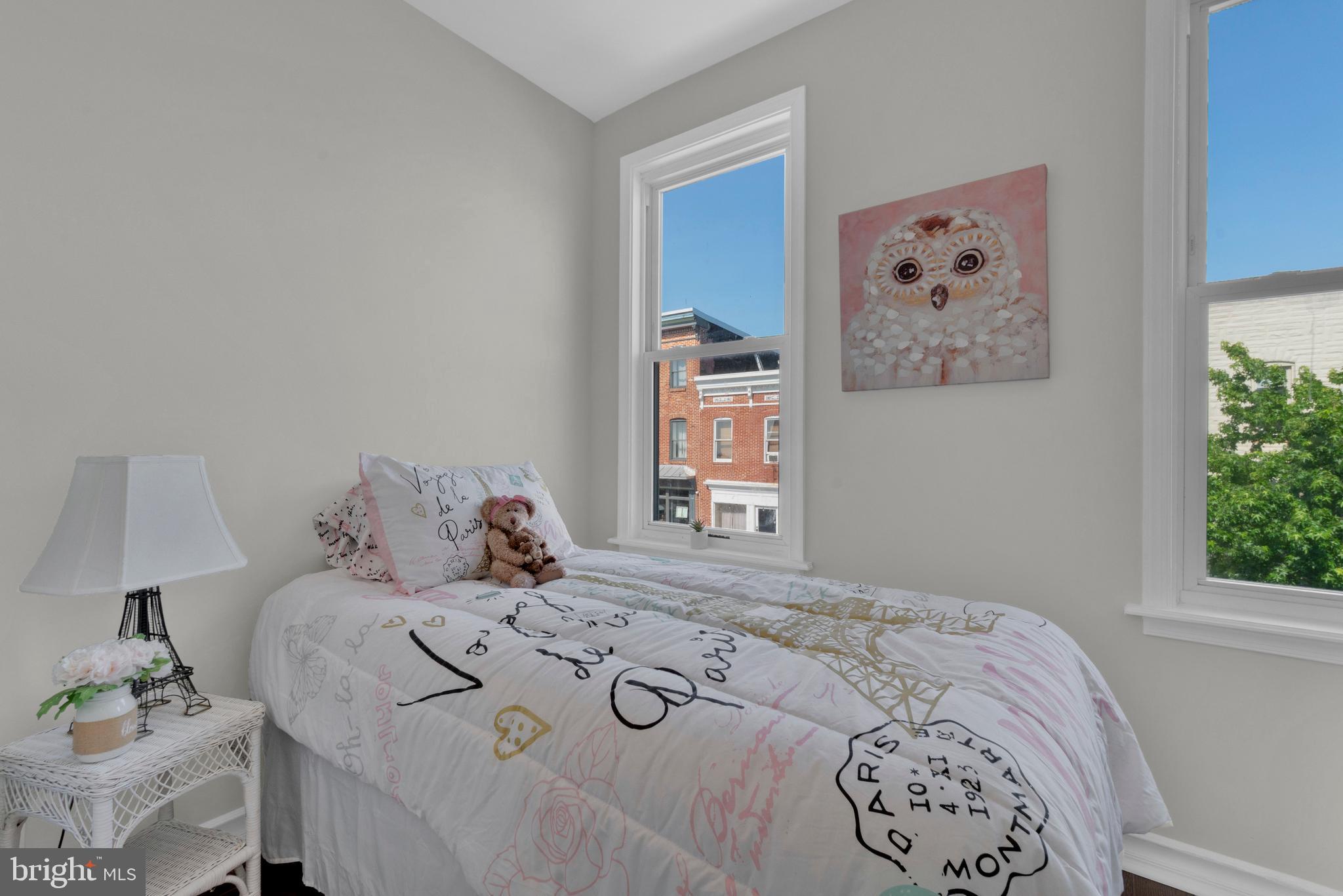255 South Conkling Street Baltimore, MD 21224 - Photo 27 of 33 a bedroom with a bed and a window