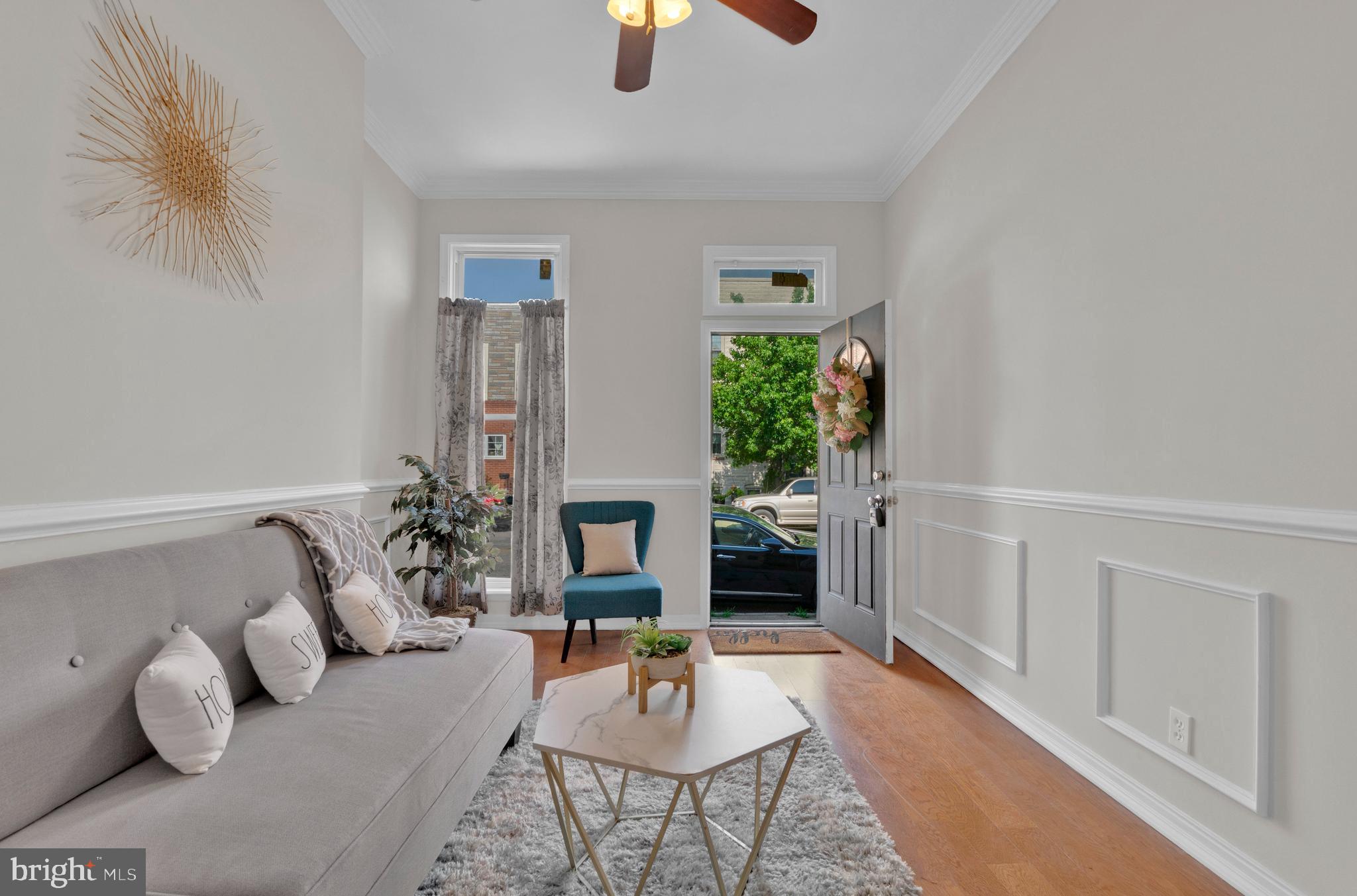 255 South Conkling Street Baltimore, MD 21224 - Photo 6 of 33 a living room with furniture and a potted plant